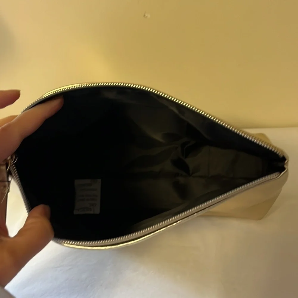 Gold Victoria’s Secret cosmetics/ small carrying bag with handle, studded heart